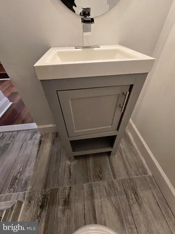 a utility room with a sink dryer and washer