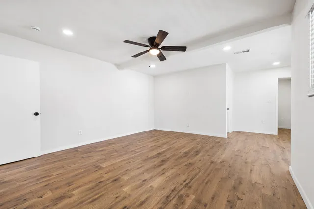 a view of a couches and a table in the patio