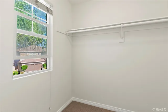 a house view with a backyard space