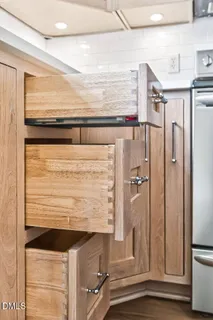 a bathroom with a shower and a sink
