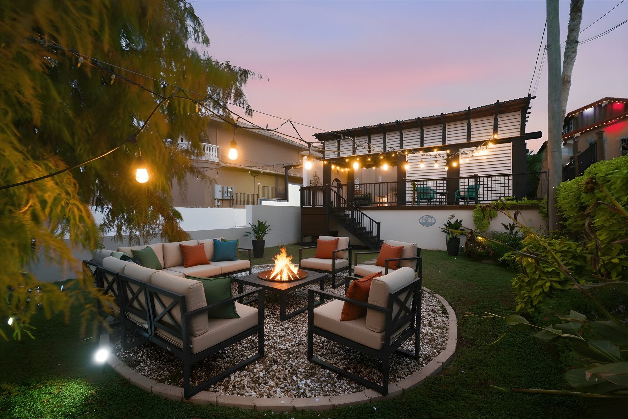 1918 Todville Road Seabrook, TX 77586 - Photo 10 of 41 Front Courtyard with firepit is a true escape and serves as a great area for making memories with family and friends.