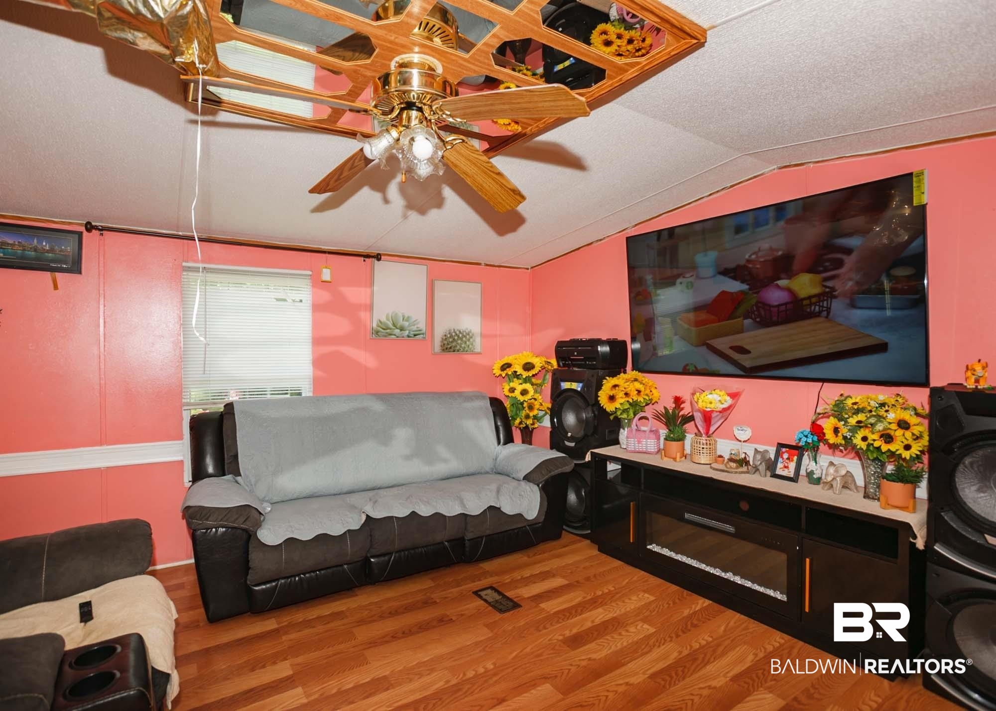 14005 County Road 49 Foley, AL 36535 - Photo 12 of 38 Living area featuring lofted ceiling, ceiling fan, and wood finished floors
