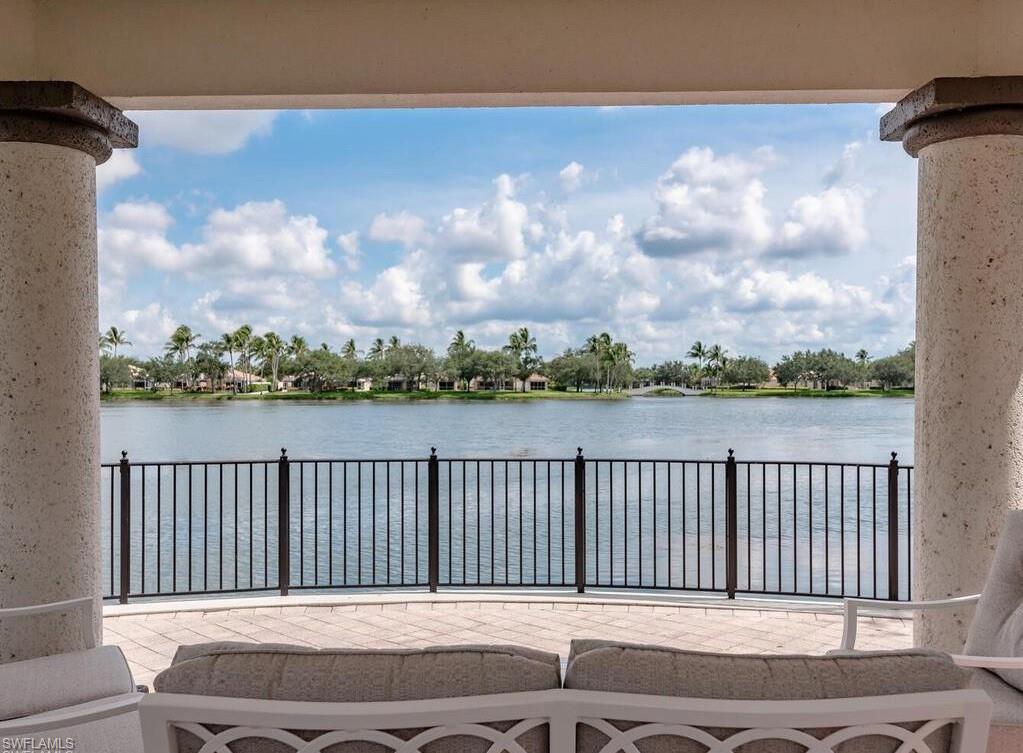 5477 Freeport Lane Naples, FL 34119 - Photo 36 of 36 a house view with a lake view