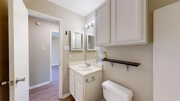a bathroom with a shower and a window
