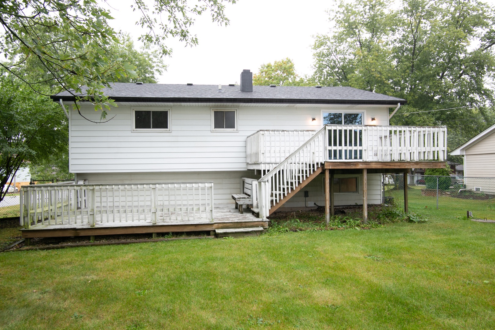 N169 North Prince Crossing Road West Chicago, IL 60185 - Photo 2 of 21 a view of a house with a backyard and deck