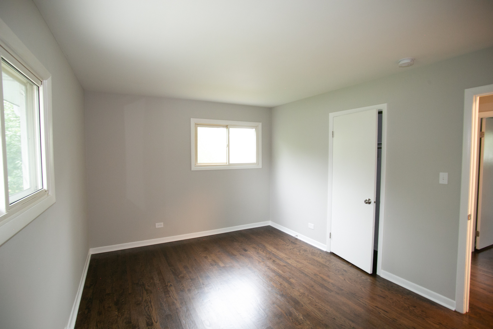 N169 North Prince Crossing Road West Chicago, IL 60185 - Photo 15 of 21 an empty room with wooden floor and windows