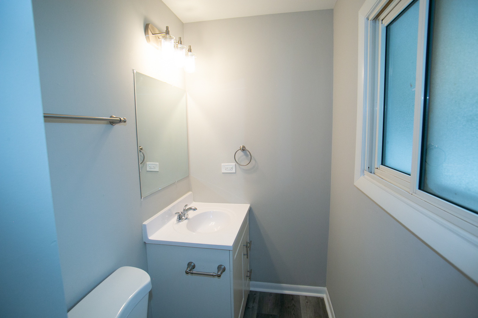 N169 North Prince Crossing Road West Chicago, IL 60185 - Photo 10 of 21 a bathroom with a sink a toilet and shower