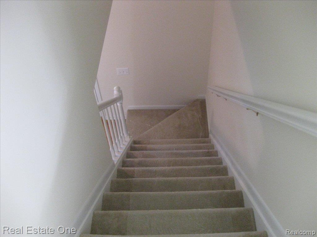 4584 Covered Bridge Road Bloomfield Hills, MI 48302 - Photo 14 of 21 Hall stairs