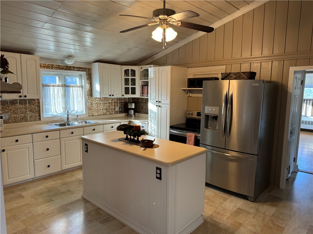 Spacious kitchen with high ceilings.