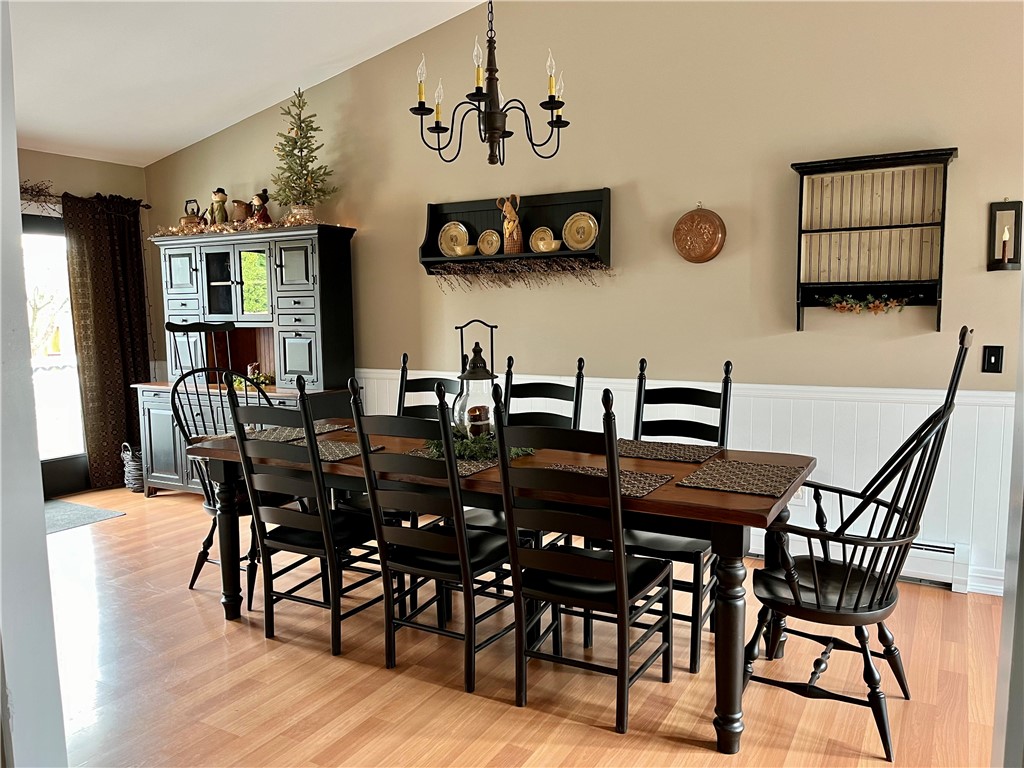 Dining room is adjacent to the kitchen and has a slider that leads to the rear yard.