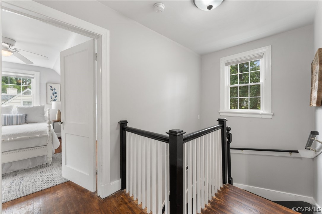 7503 Glebe Road Henrico, VA 23229 - Photo 15 of 25 a view of a hallway with a window and wooden floor