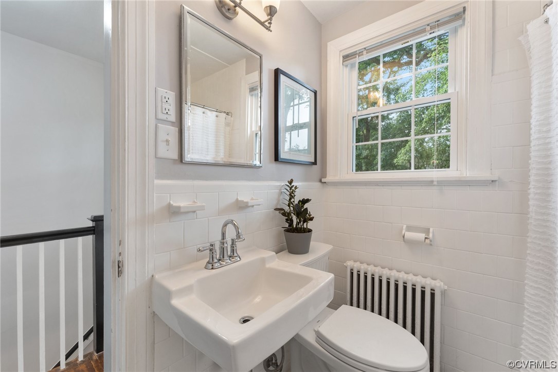 7503 Glebe Road Henrico, VA 23229 - Photo 19 of 25 a bathroom with a sink and a mirror