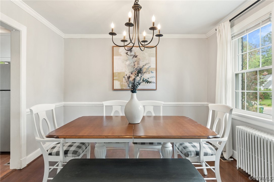 7503 Glebe Road Henrico, VA 23229 - Photo 5 of 25 a view of a dining room with furniture window and wooden floor
