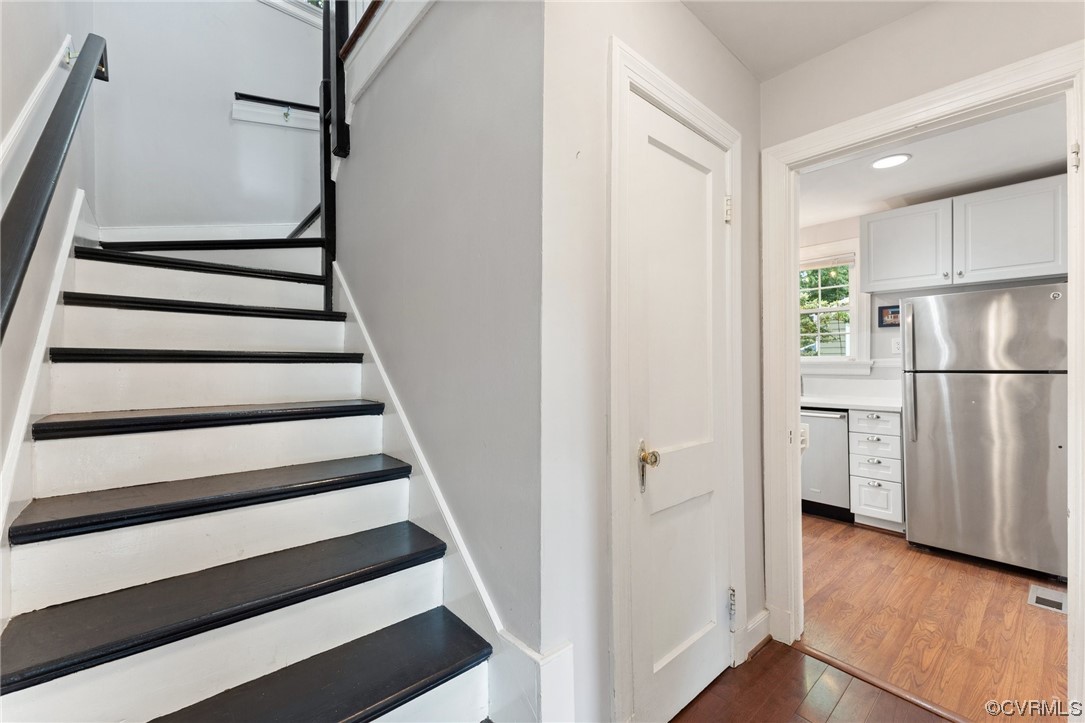 7503 Glebe Road Henrico, VA 23229 - Photo 10 of 25 a view of entryway with wooden floor and stairs