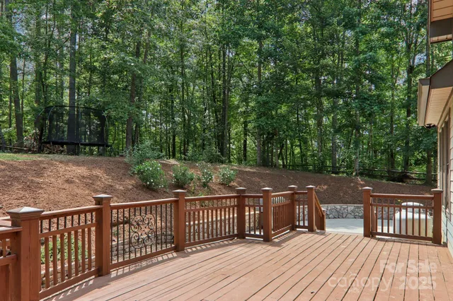a view of deck with wooden floor and outdoor seating