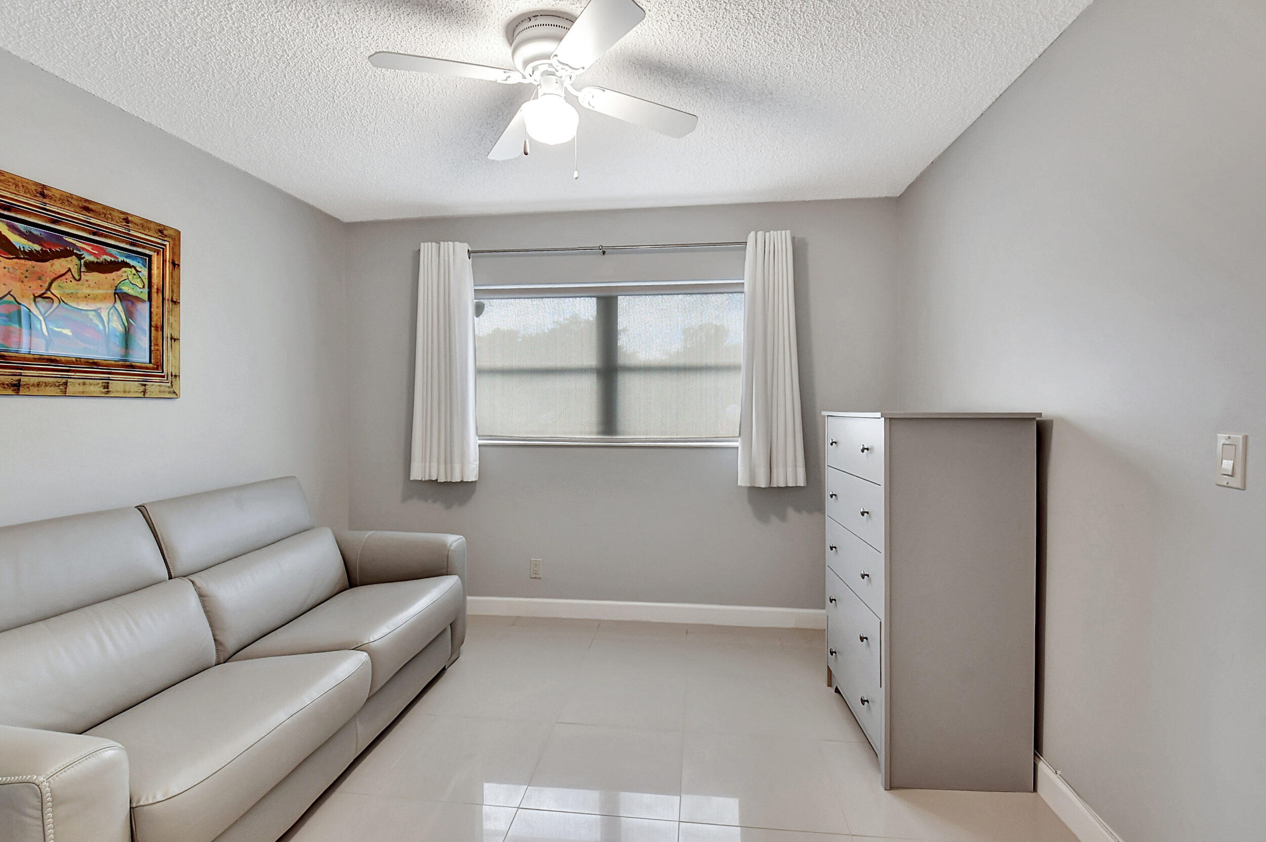 14520 Lucy Drive Delray Beach, FL 33484 - Photo 25 of 63 a living room with furniture and a window