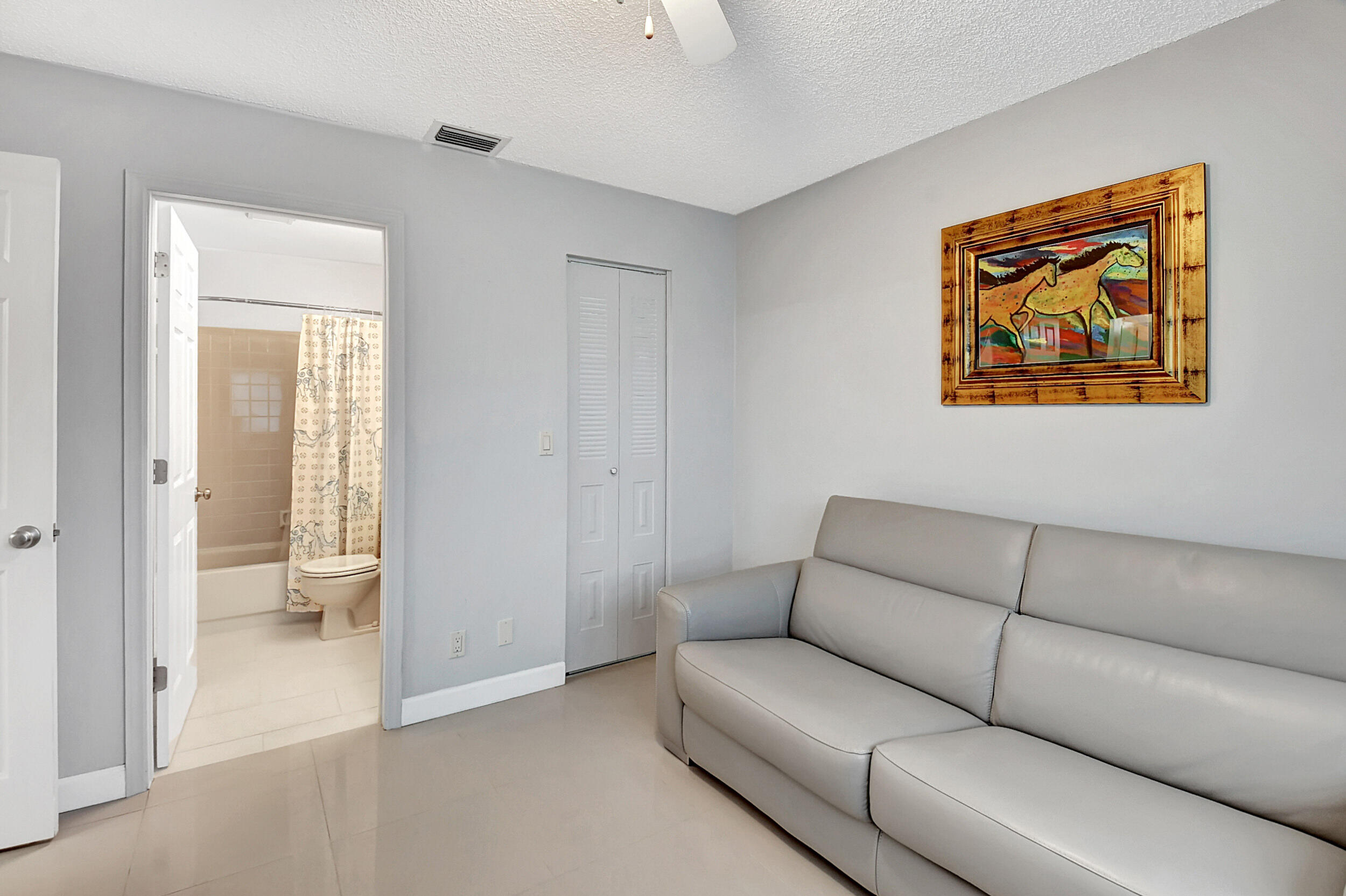 14520 Lucy Drive Delray Beach, FL 33484 - Photo 26 of 63 a living room with furniture and a gate