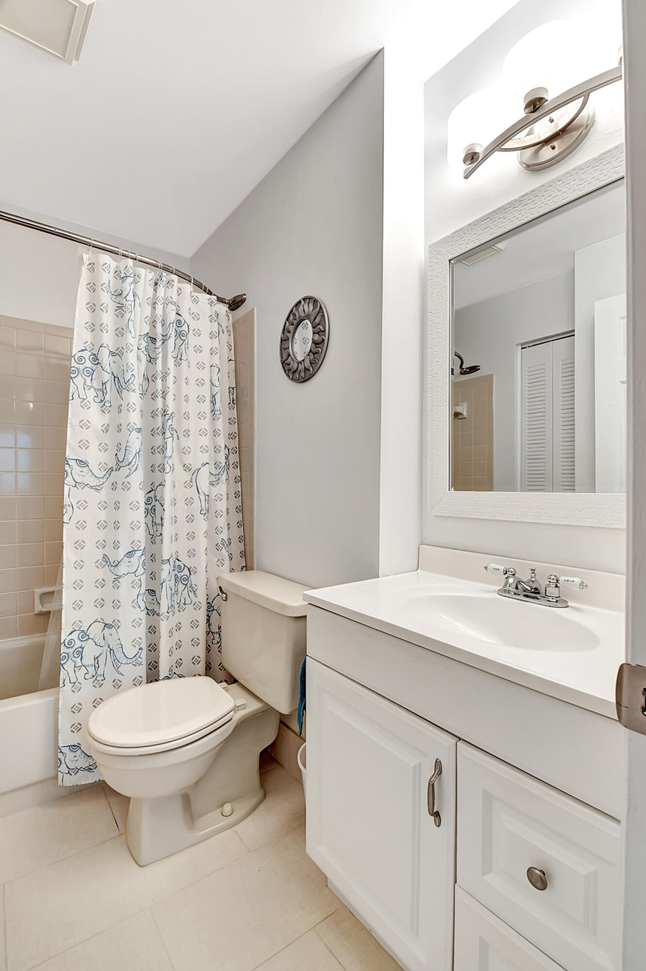 14520 Lucy Drive Delray Beach, FL 33484 - Photo 28 of 63 a bathroom with a sink a toilet and shower