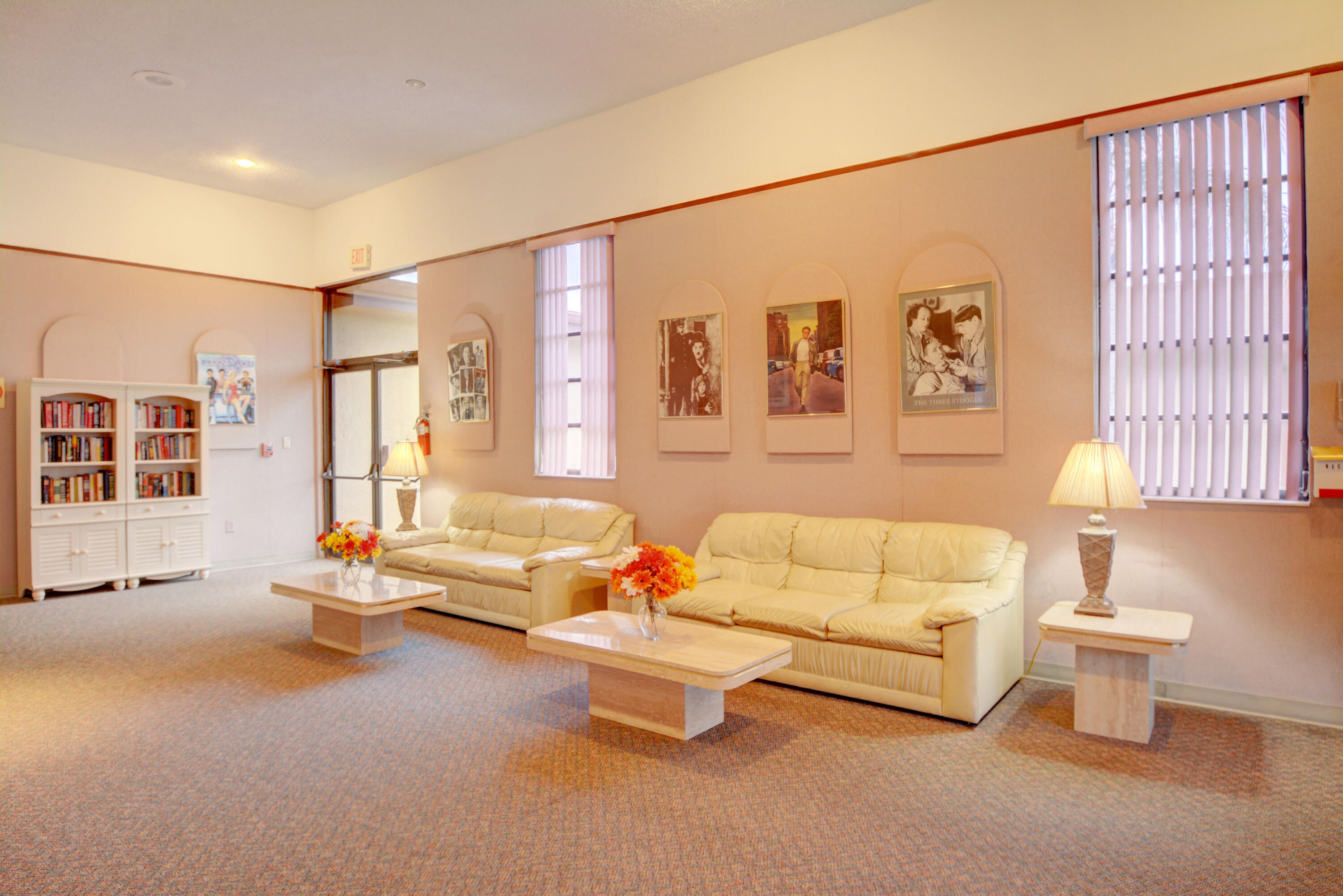 14520 Lucy Drive Delray Beach, FL 33484 - Photo 59 of 63 a living room with furniture and a painting on the wall