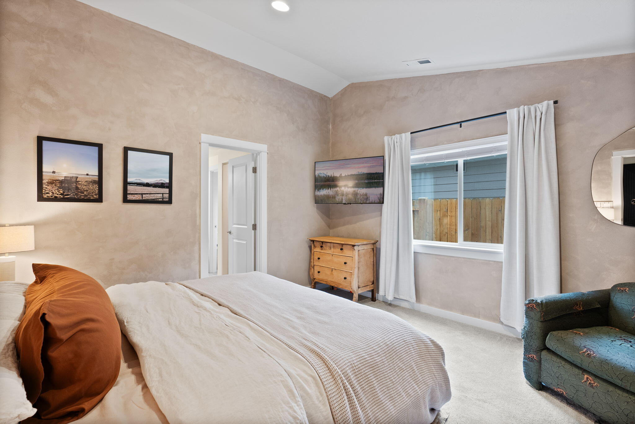 632 North Reed Street Sisters, OR 97759 - Photo 13 of 36 a bedroom with a bed and a couch