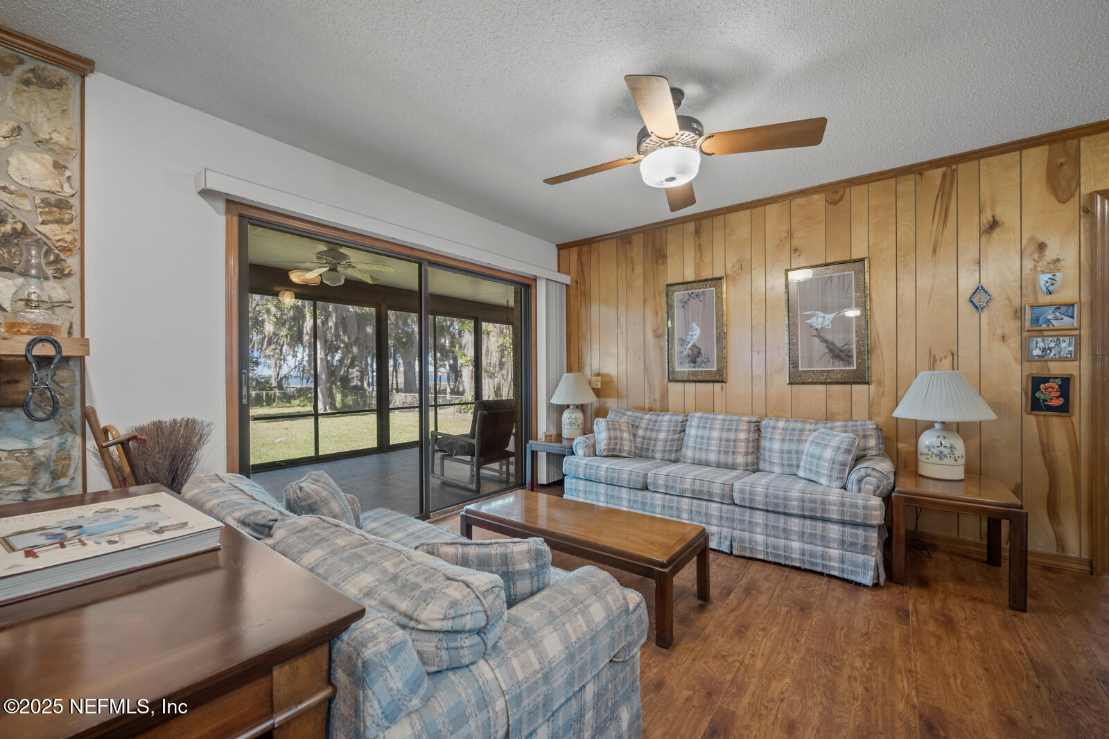 6365 Jack Wright Island Road St. Augustine, FL 32092 - Photo 18 of 53 a living room with furniture and a large window