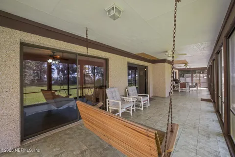 a living room with large windows