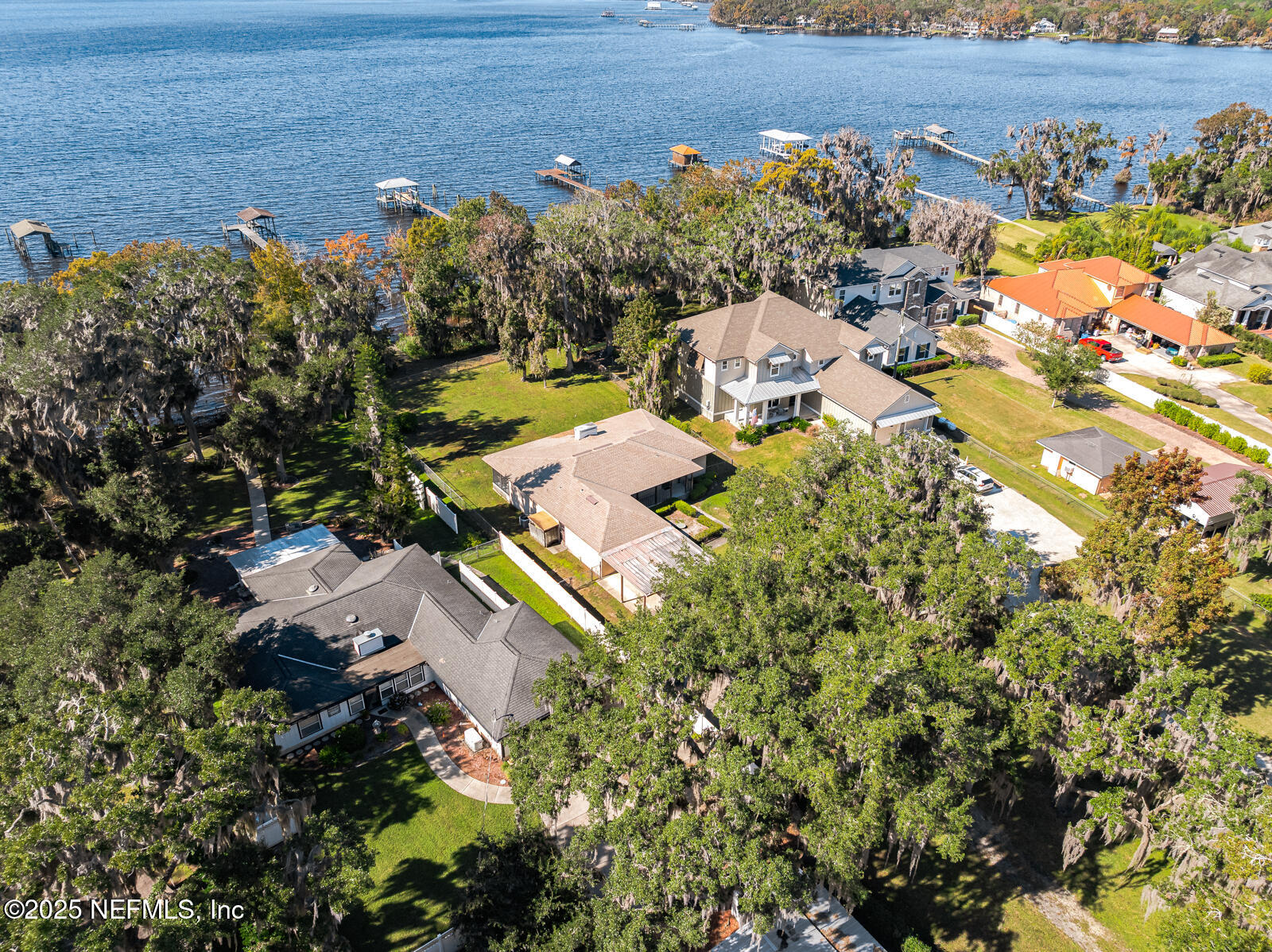 6365 Jack Wright Island Road St. Augustine, FL 32092 - Photo 3 of 53 an aerial view of a house with a lake view