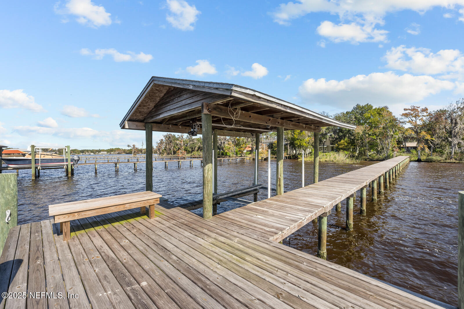 6365 Jack Wright Island Road St. Augustine, FL 32092 - Photo 36 of 53 a view of balcony with wooden floor and fence