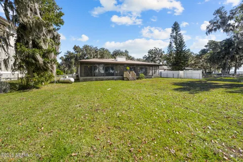 a view of a house with a big yard