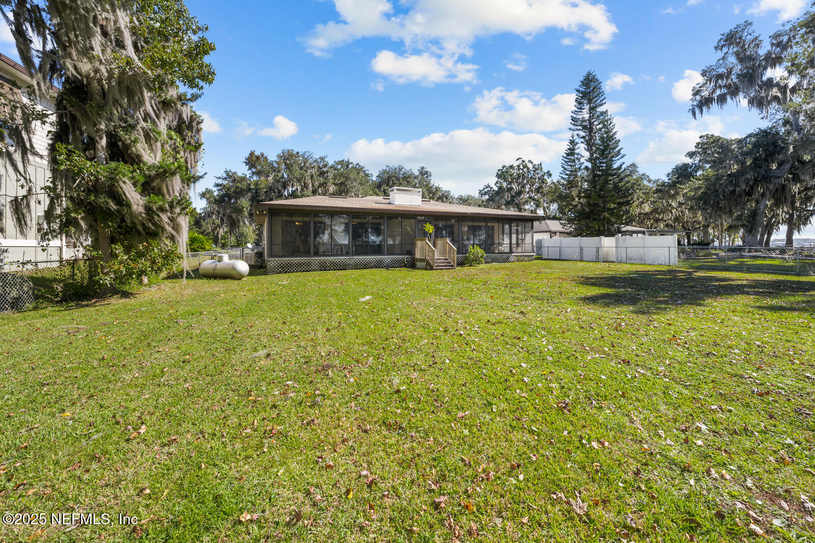 6365 Jack Wright Island Road St. Augustine, FL 32092 - Photo 43 of 53 a view of a house with a yard