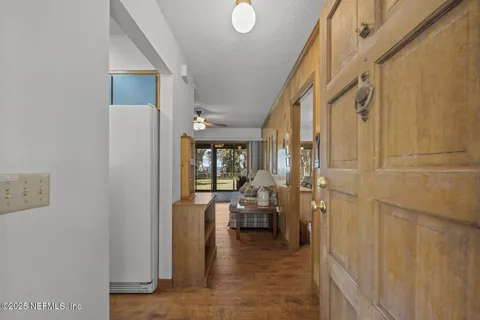 a view of a bathroom with a glass door