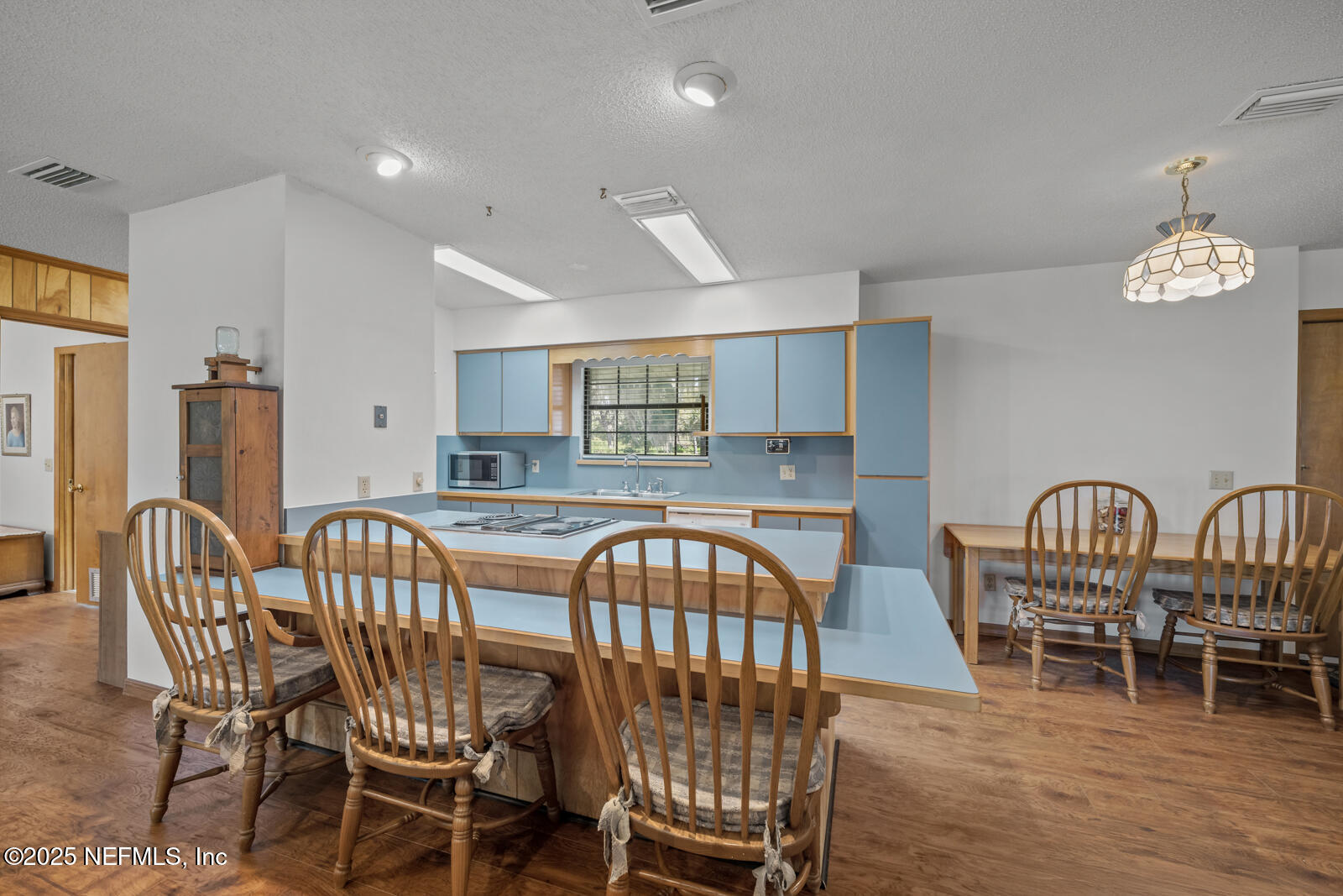6365 Jack Wright Island Road St. Augustine, FL 32092 - Photo 10 of 53 a view of a dining room with furniture