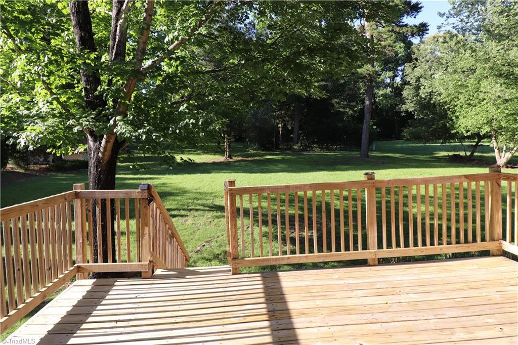 5765 Phillips Bridge Road Winston-Salem, NC 27104 - Photo 18 of 29 Nice large deck and back yard with plenty of trees for shade!