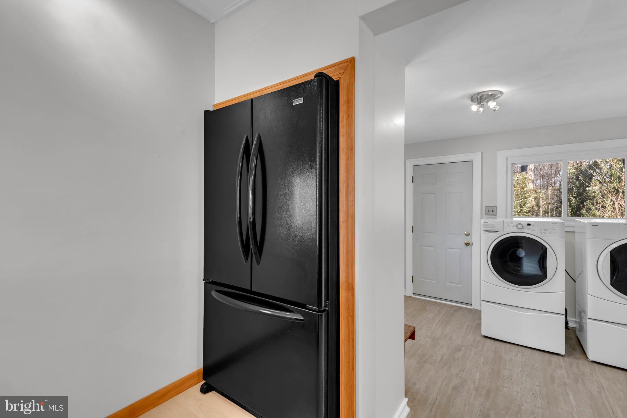 4 Spring Knoll Drive Pasadena, MD 21122 - Photo 12 of 33 laundry right off of kitchen