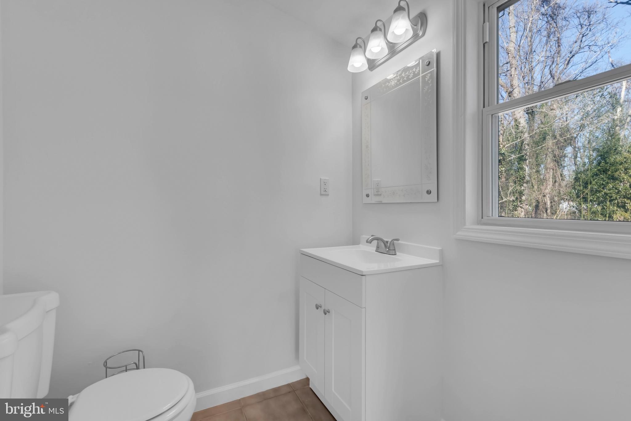 4 Spring Knoll Drive Pasadena, MD 21122 - Photo 21 of 33 half bath in living room addition