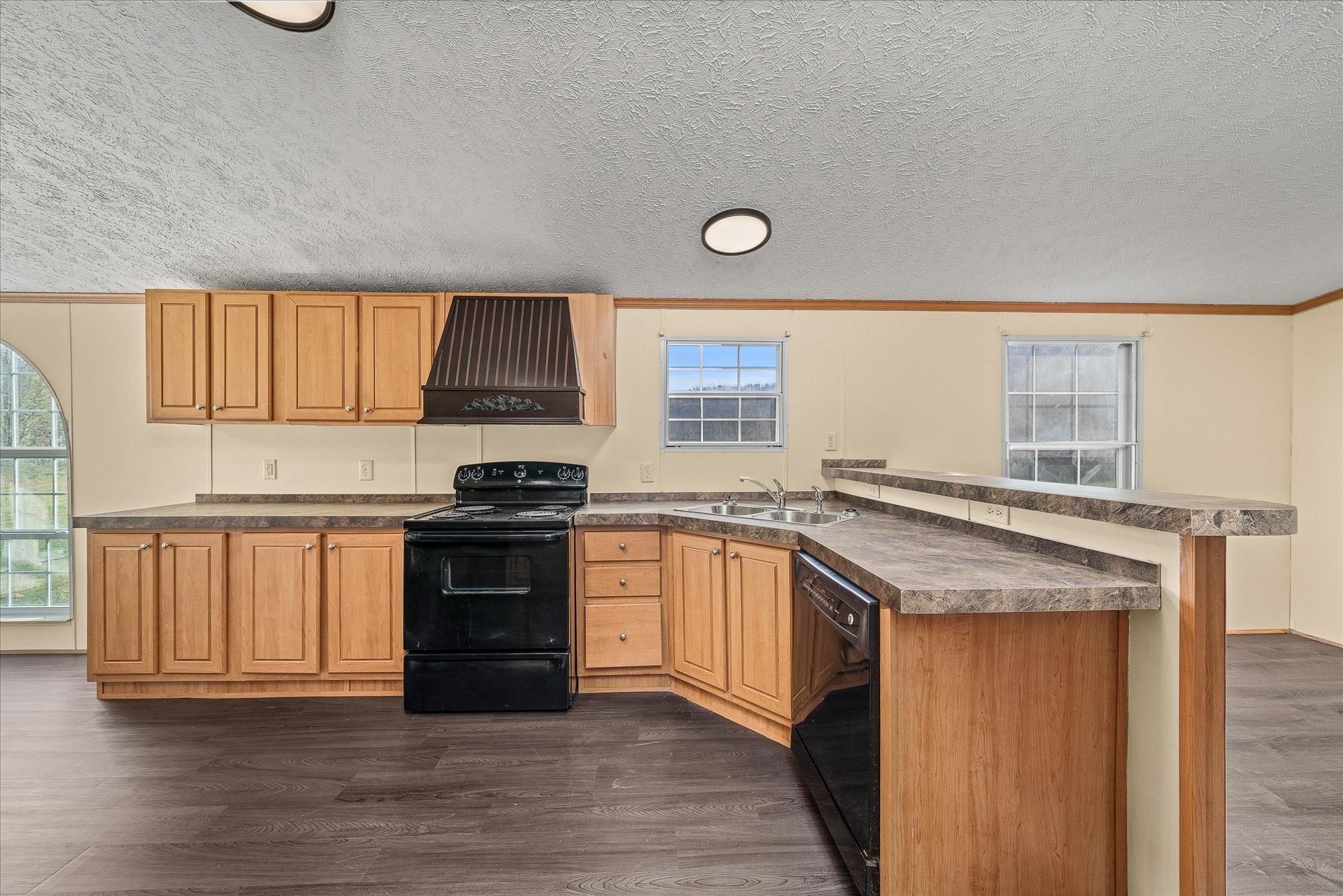 1476 Conrad Templeton Road Quebeck, TN 38579 - Photo 12 of 31 a kitchen with granite countertop a stove and a sink