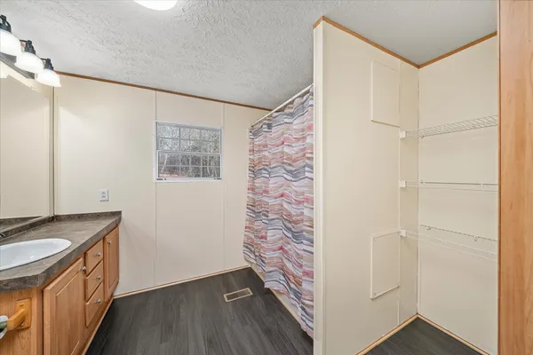 a view of hallway with washer and dryer