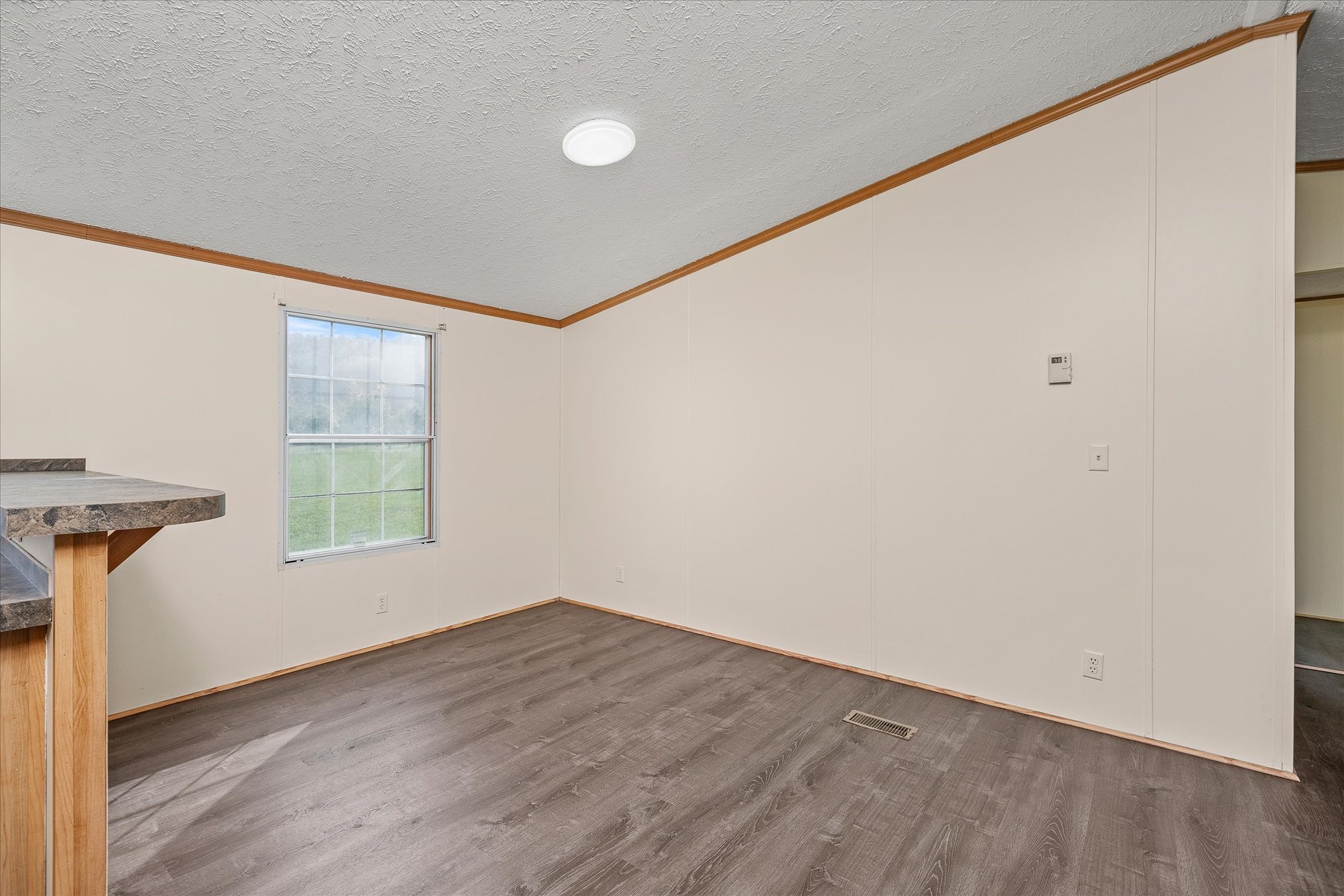 1476 Conrad Templeton Road Quebeck, TN 38579 - Photo 10 of 31 a view of a room with wooden floor and windows