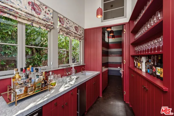 a large kitchen with a large window