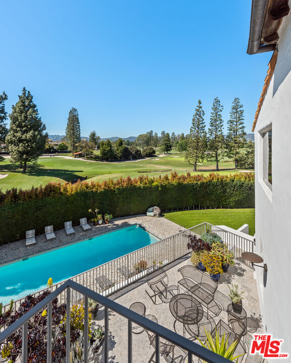 211 South Muirfield Road Los Angeles, CA 90004 - Photo 30 of 38 a view of a lake with a garden