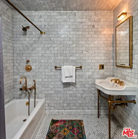 a bathroom with a sink and a bathtub