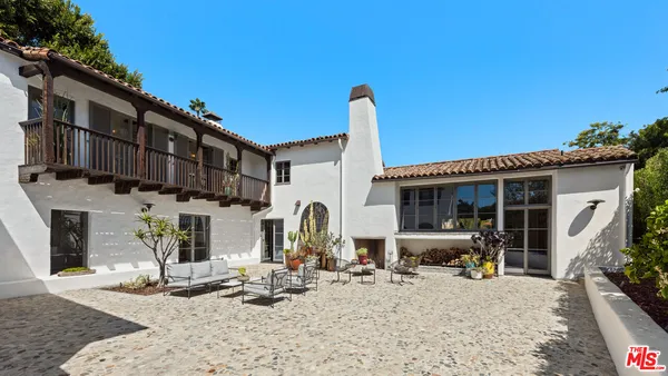 a front view of a house with patio