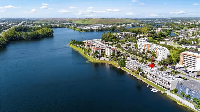 an aerial view of a city with ocean view