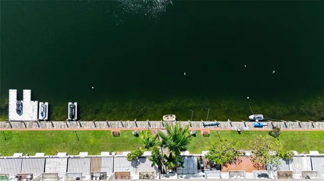 a view of house with a yard