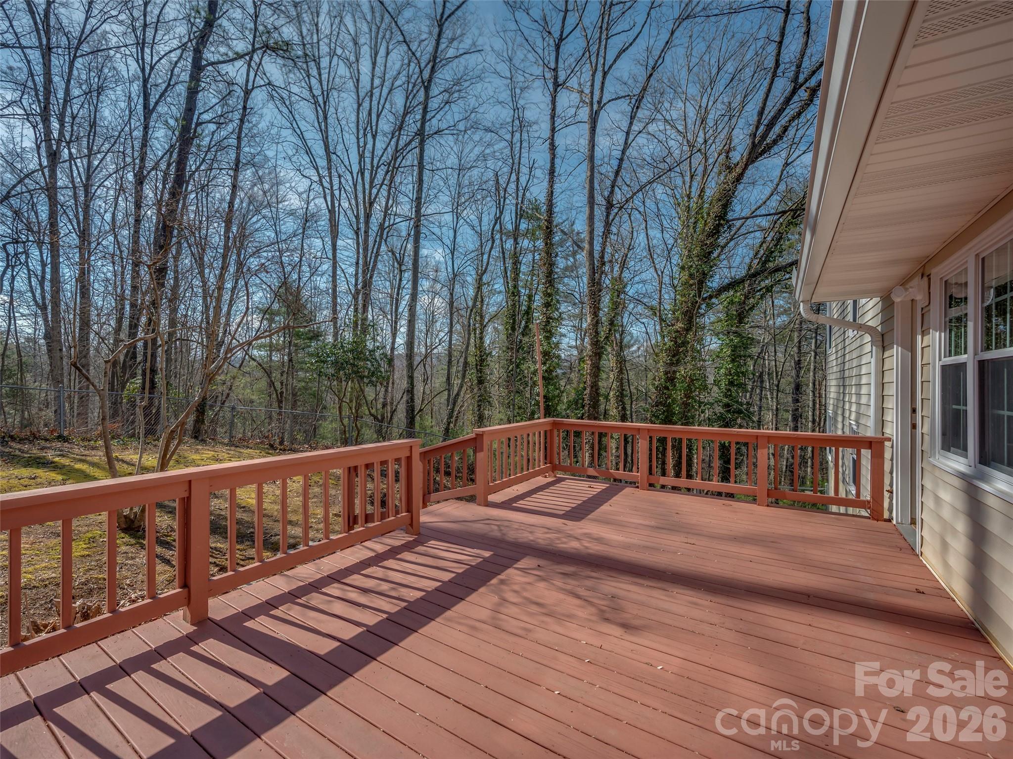 3 Country Road Hendersonville, NC 28791 - Photo 17 of 48 a view of balcony with wooden floor and fence