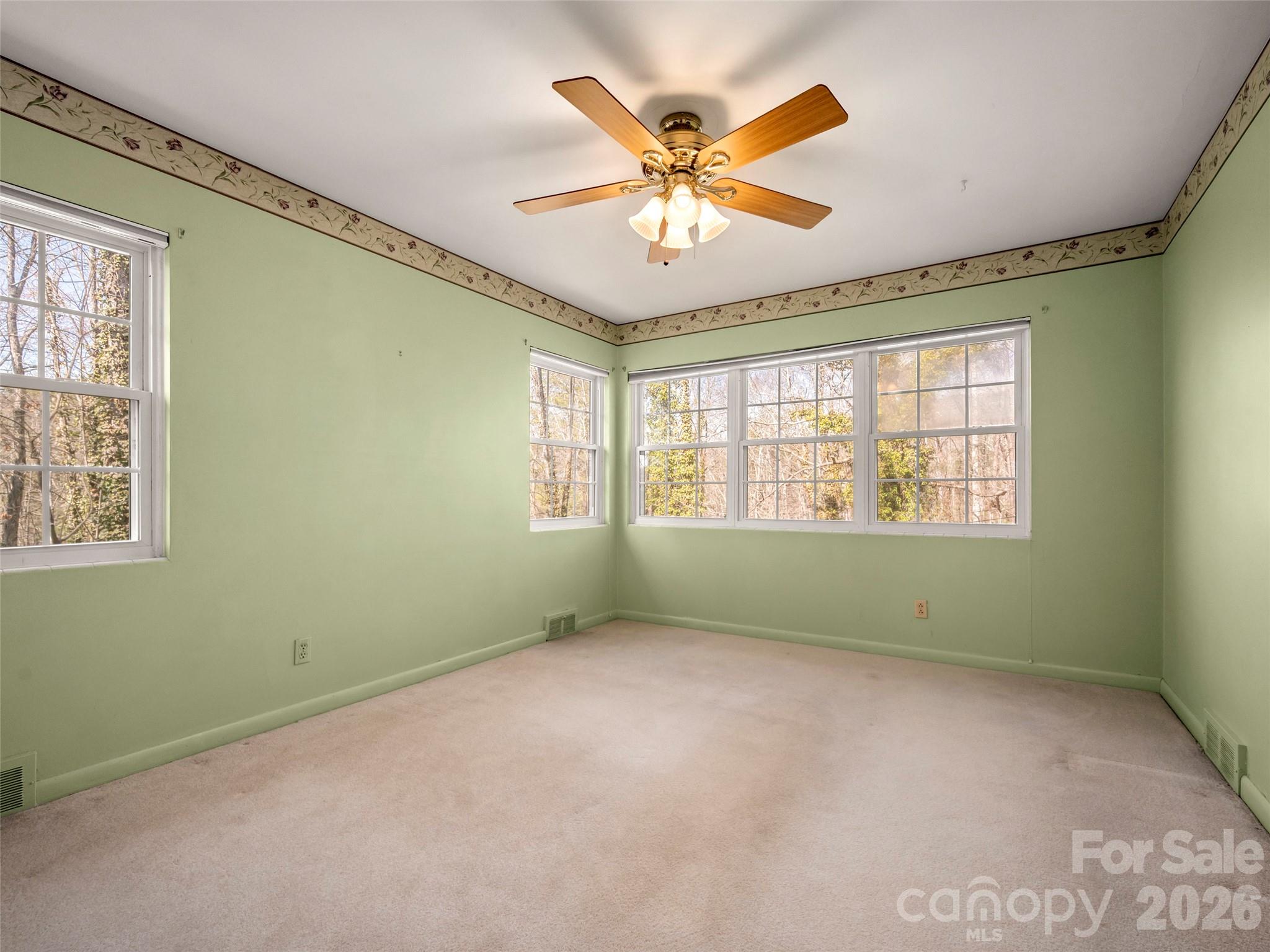 3 Country Road Hendersonville, NC 28791 - Photo 21 of 48 a view of an empty room with a window