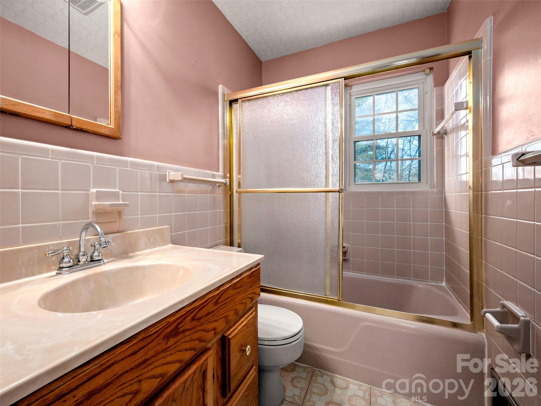 3 Country Road Hendersonville, NC 28791 - Photo 23 of 48 a bathroom with a sink toilet and shower