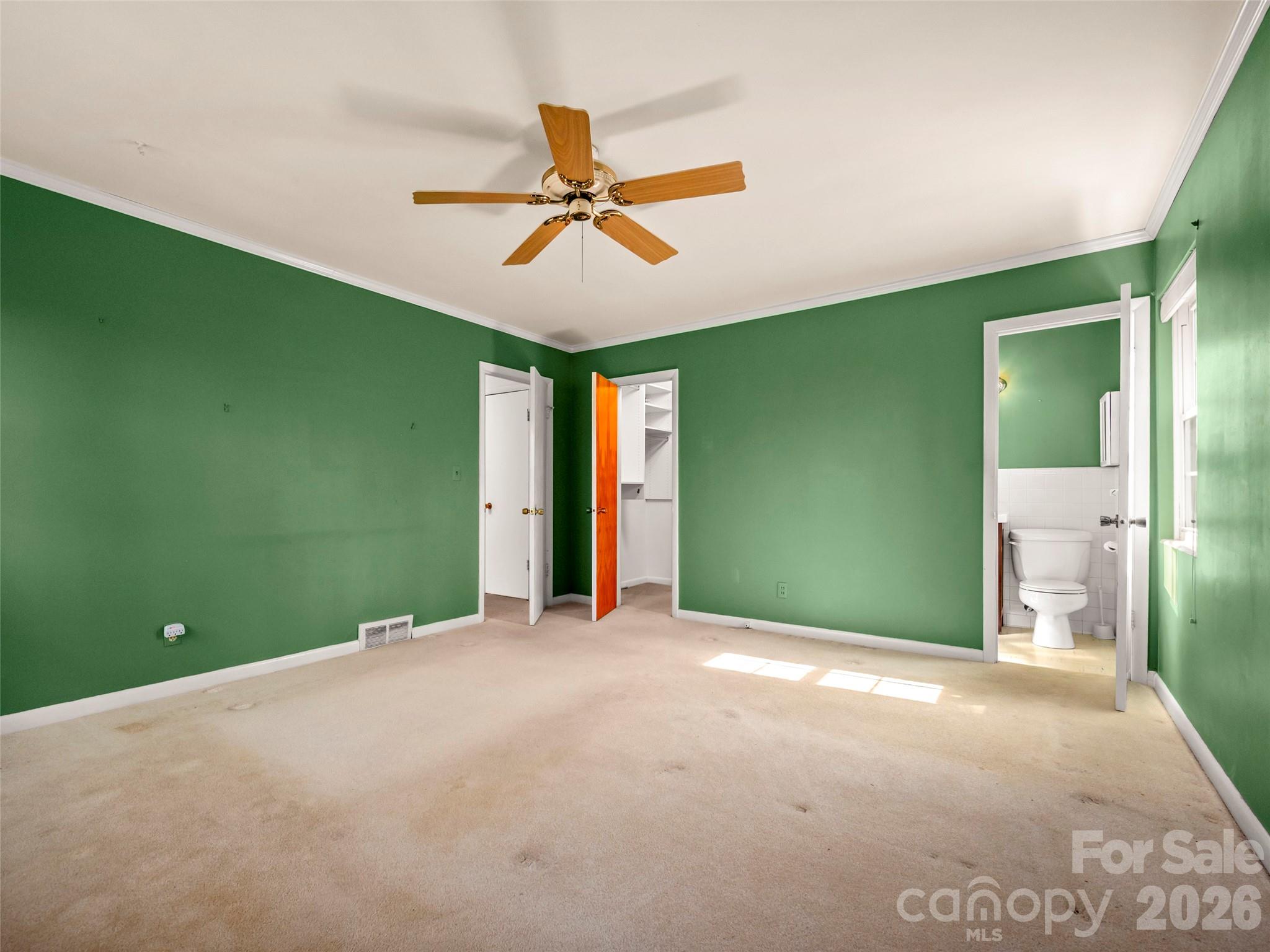 3 Country Road Hendersonville, NC 28791 - Photo 25 of 48 a view of a livingroom with a fan and a ceiling fan