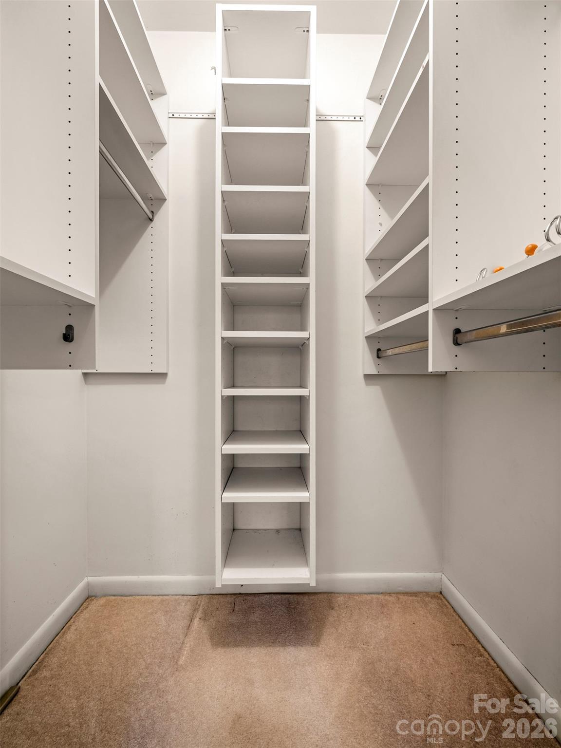 3 Country Road Hendersonville, NC 28791 - Photo 27 of 48 a view of walk in closet with empty racks