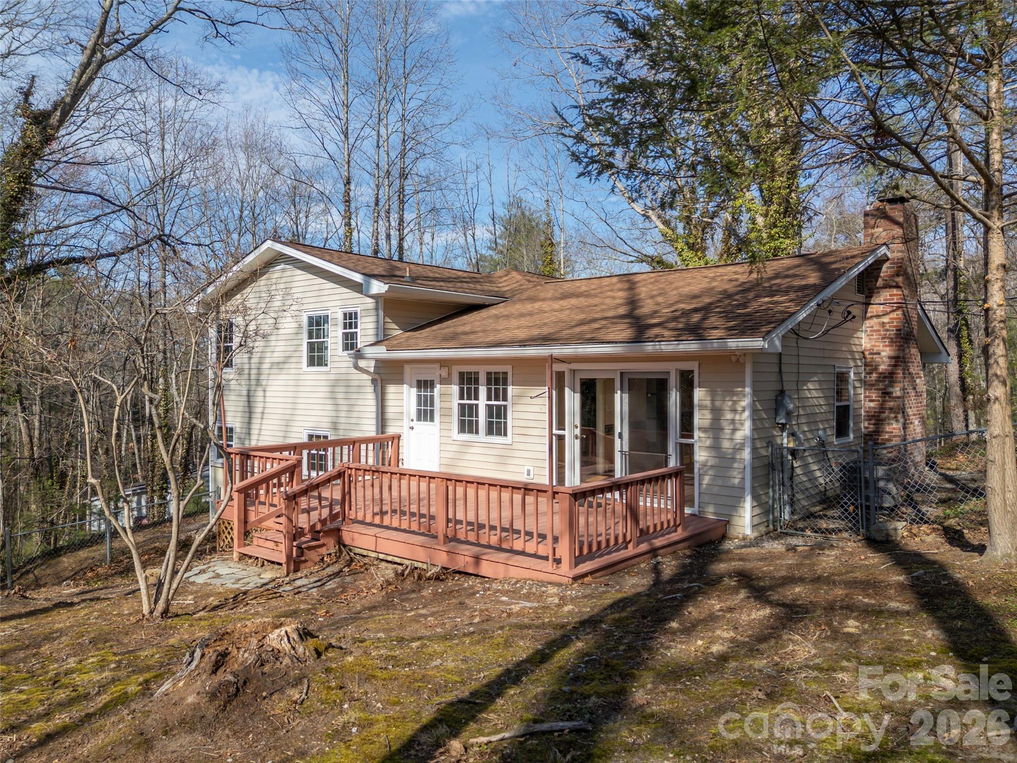 3 Country Road Hendersonville, NC 28791 - Photo 41 of 48 a view of a house with a yard